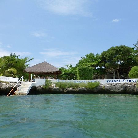 Talima Beach Villas & Dive Resort Cebu Esterno foto