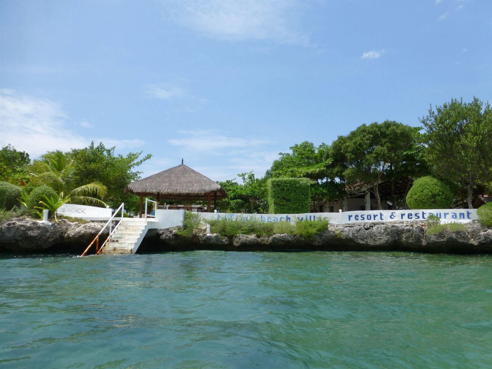 Talima Beach Villas & Dive Resort Cebu Esterno foto