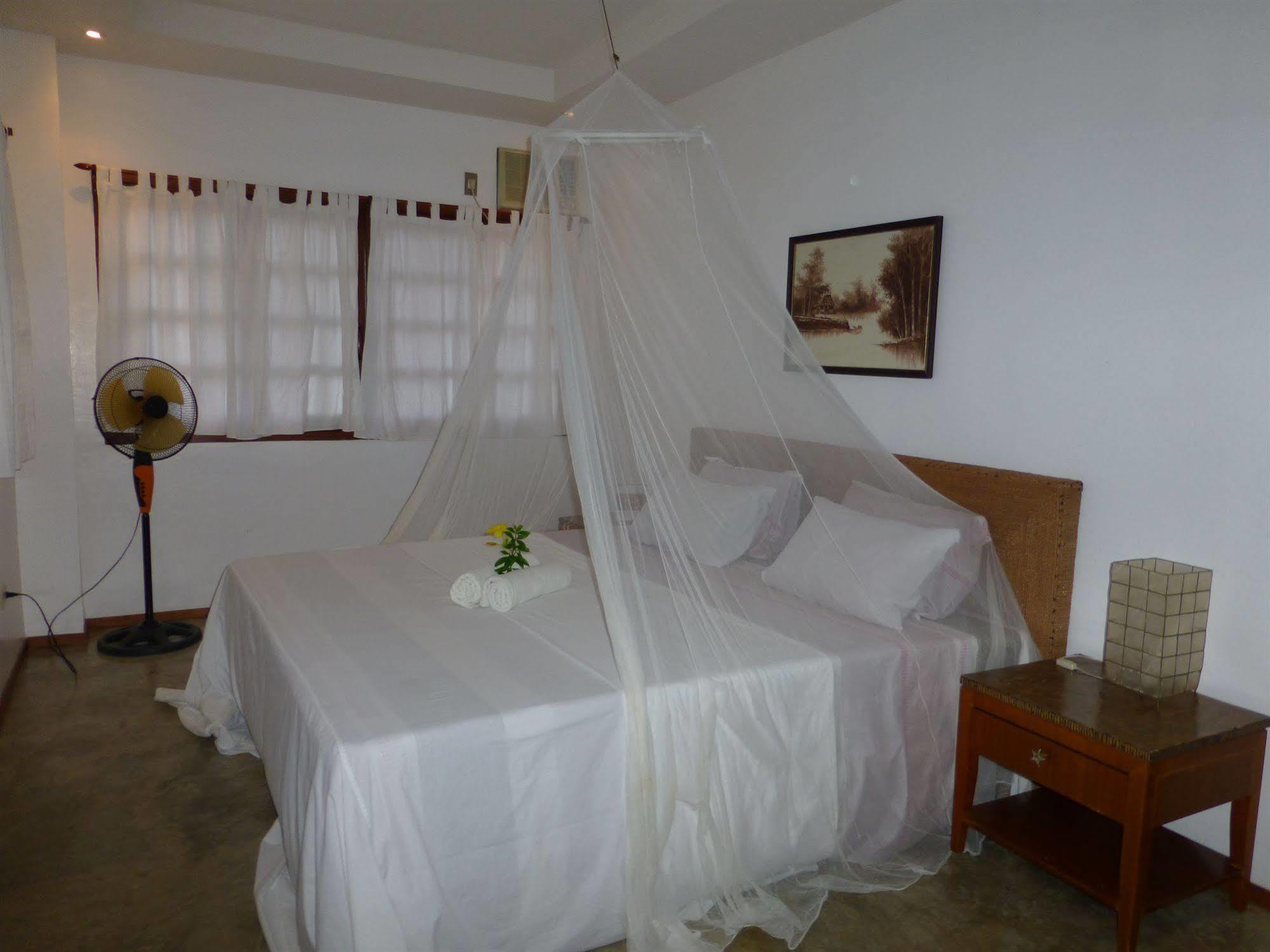 Talima Beach Villas & Dive Resort Cebu Esterno foto