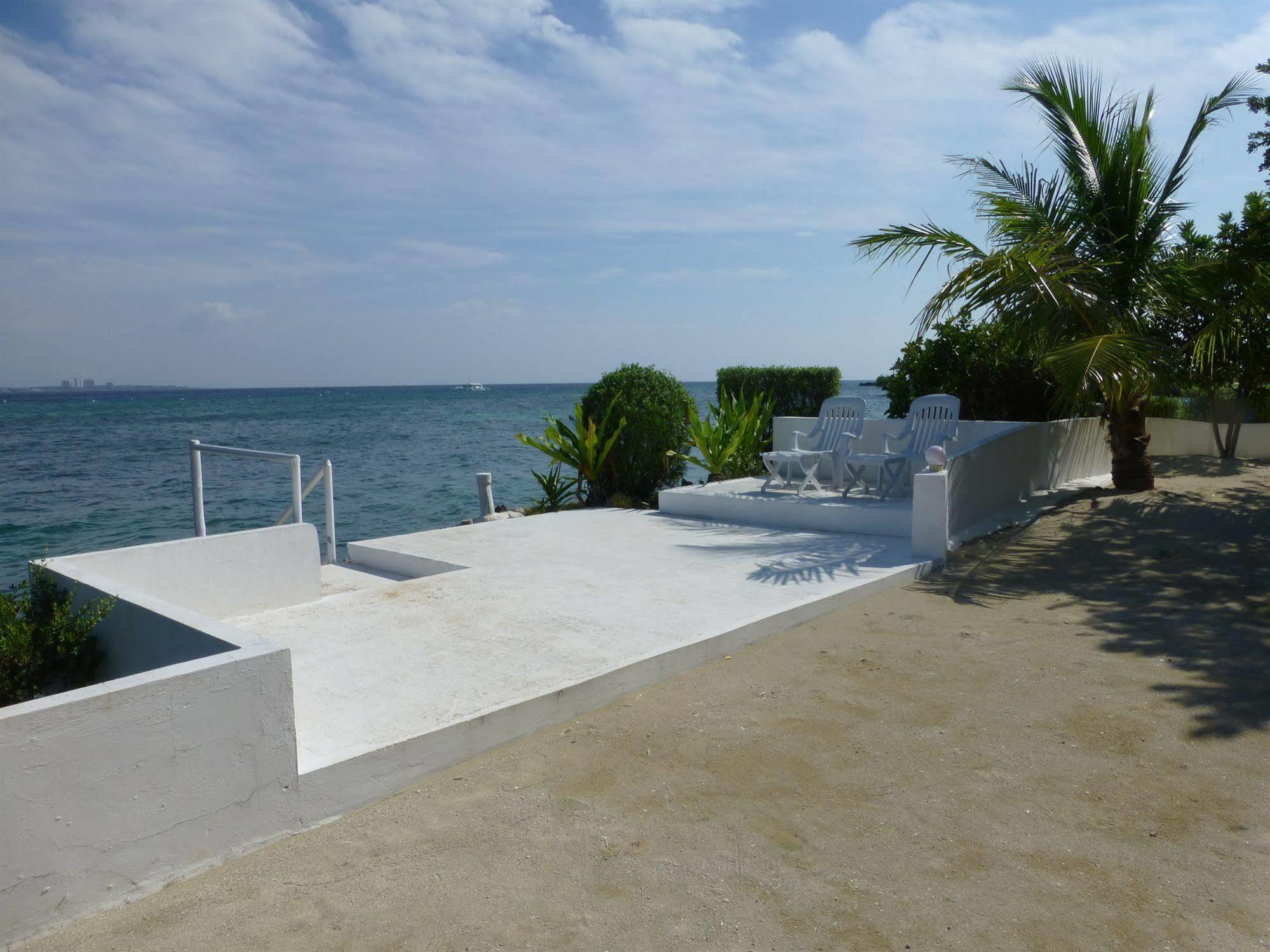Talima Beach Villas & Dive Resort Cebu Esterno foto